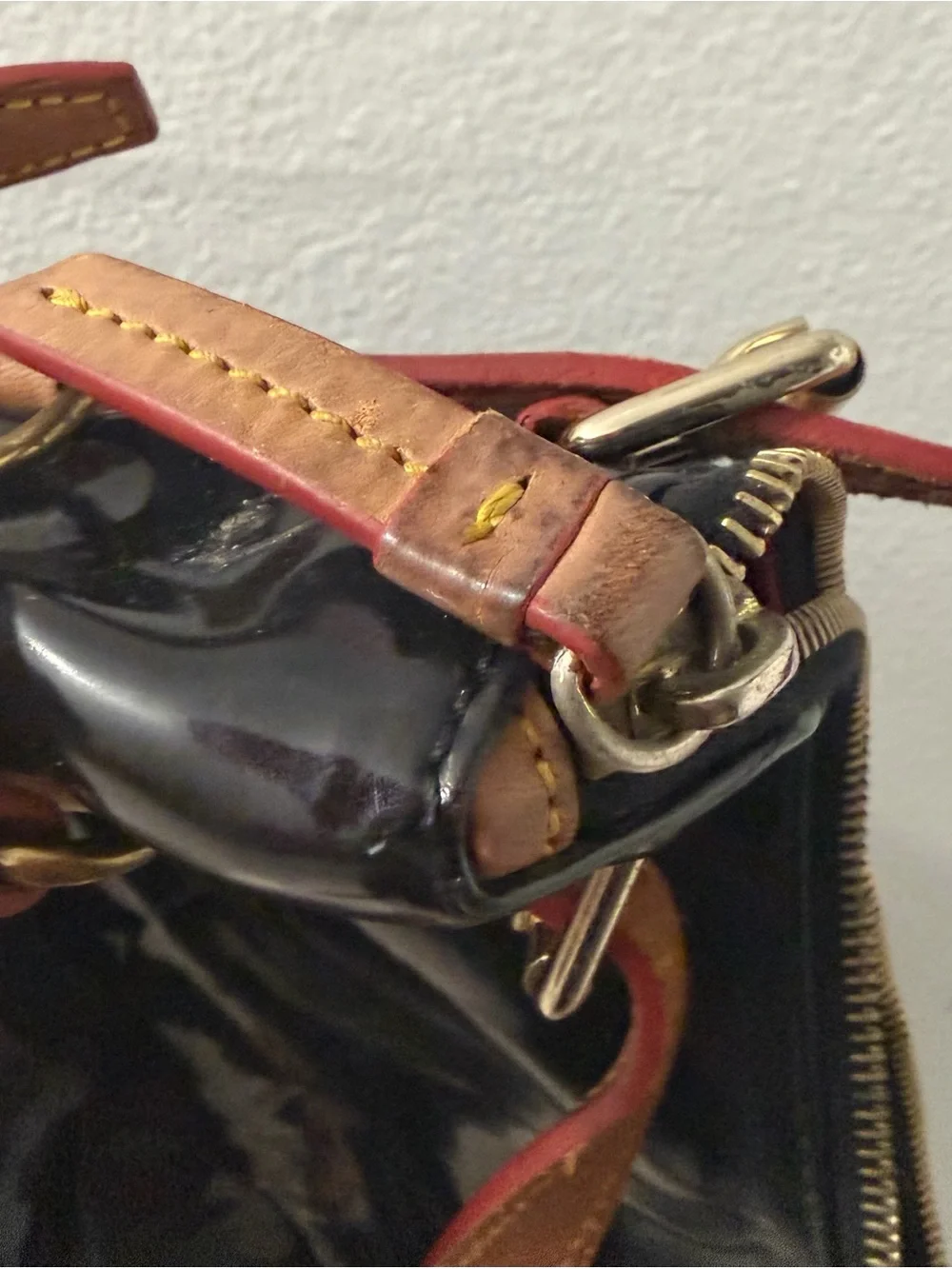 Dooney & Bourke Black Patent Shoulder Bag with Tan Trim and Red Lining